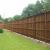 Arlington wood fence
8' Cedar Board on Board
Hand Dipped ( Dark Brown)
Postmaster Post with Cedar cover picket
Concrete Footer

~DFW Fence Contractor~